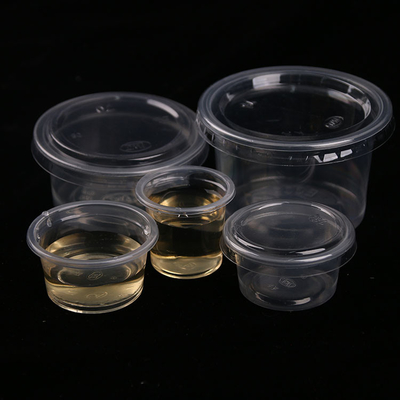 La taza de aderezo plástica transparente selló el alto material del burro de la microonda disponible