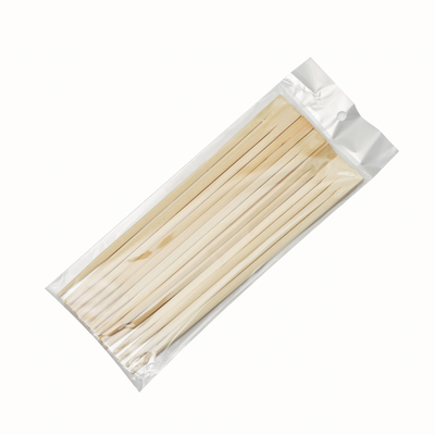 Palillos de bambú desechables chinos en palillos de madera de bambú de papel individual