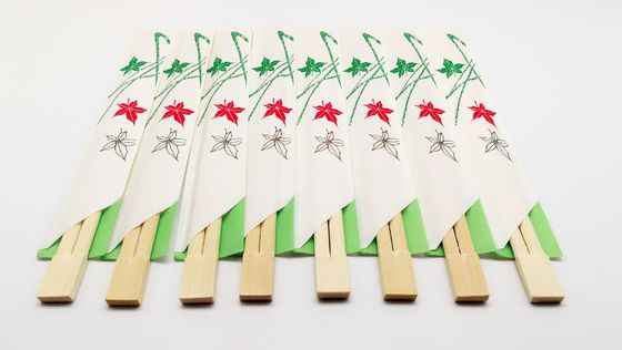 La fuente directa de la base HERMANA los palillos de bambú de Dispossiable con la mitad envuelta en papel para la comida china