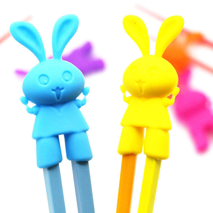 Palillos de entrenamiento de aprendizaje de dibujos animados de silicona reutilizables para niños con soportes