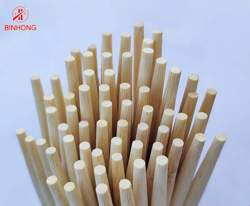 Palillos de cocinar de bambú disponibles de los gemelos los 23cm