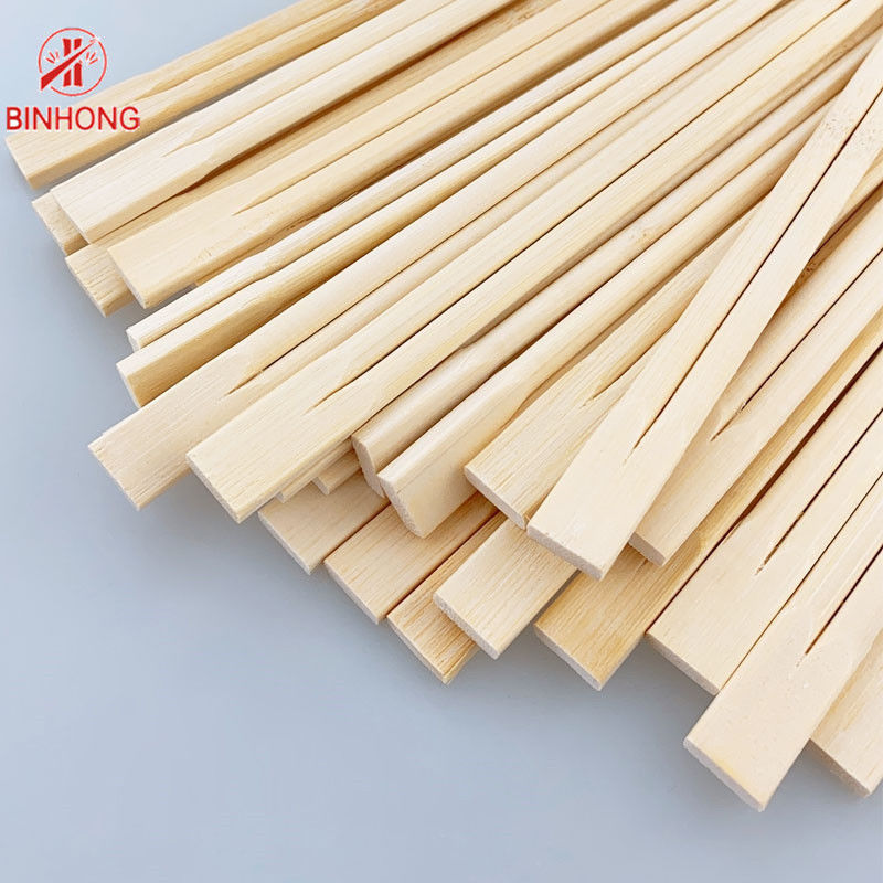 Palillos de cocinar de bambú disponibles de los gemelos los 23cm