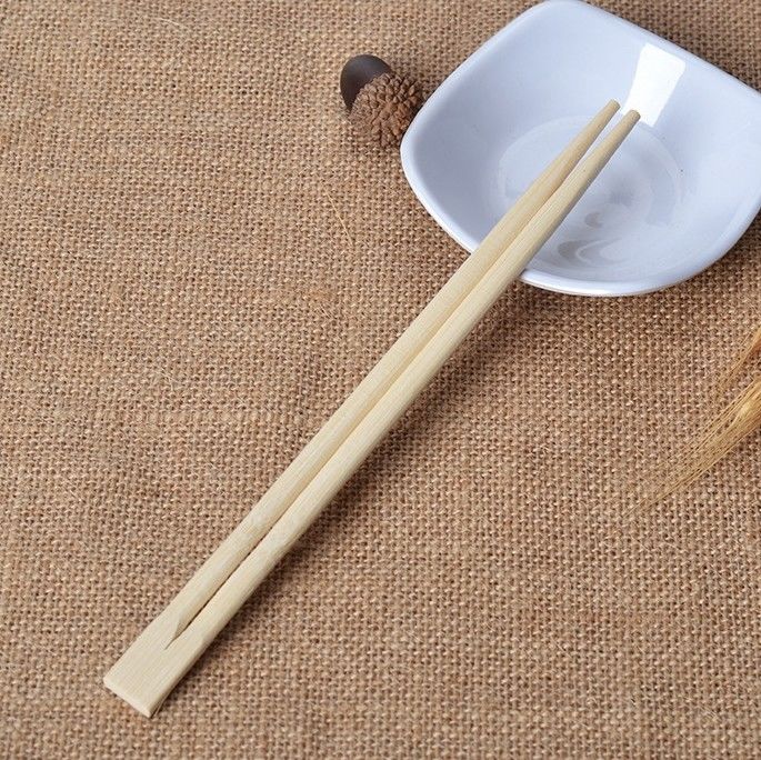 Palillos de cocinar de bambú disponibles de los gemelos los 23cm