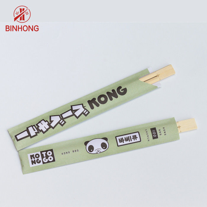 Palillos disponibles de bambú natural empaquetados en papel del sushi con el logotipo modificado para requisitos particulares