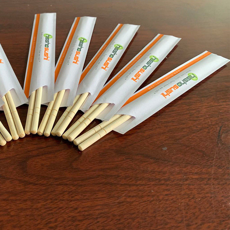 Palillos de bambú japoneses chinos disponibles con envuelto en papel
