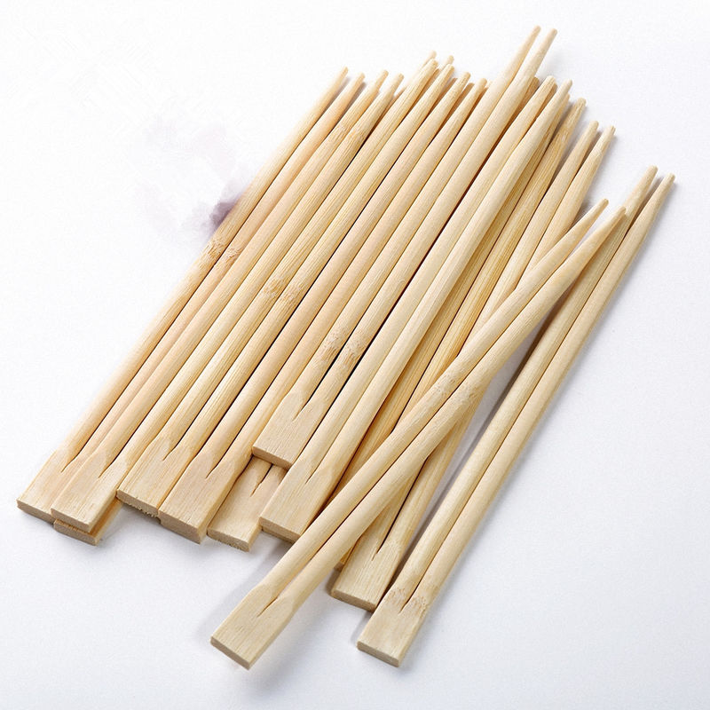 Palillos disponibles de bambú natural empaquetados en papel del sushi con el logotipo modificado para requisitos particulares