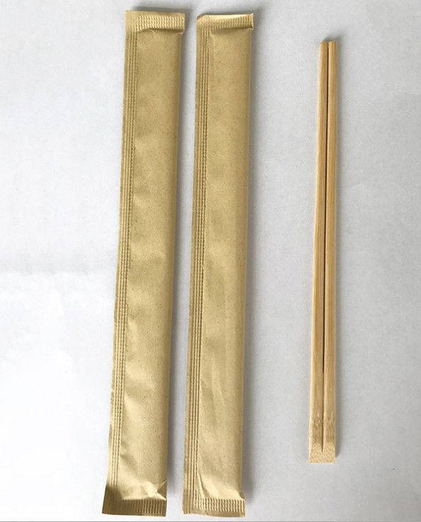 Palillos amistosos de bambú disponibles de Eco con el embalaje del papel de Kraft